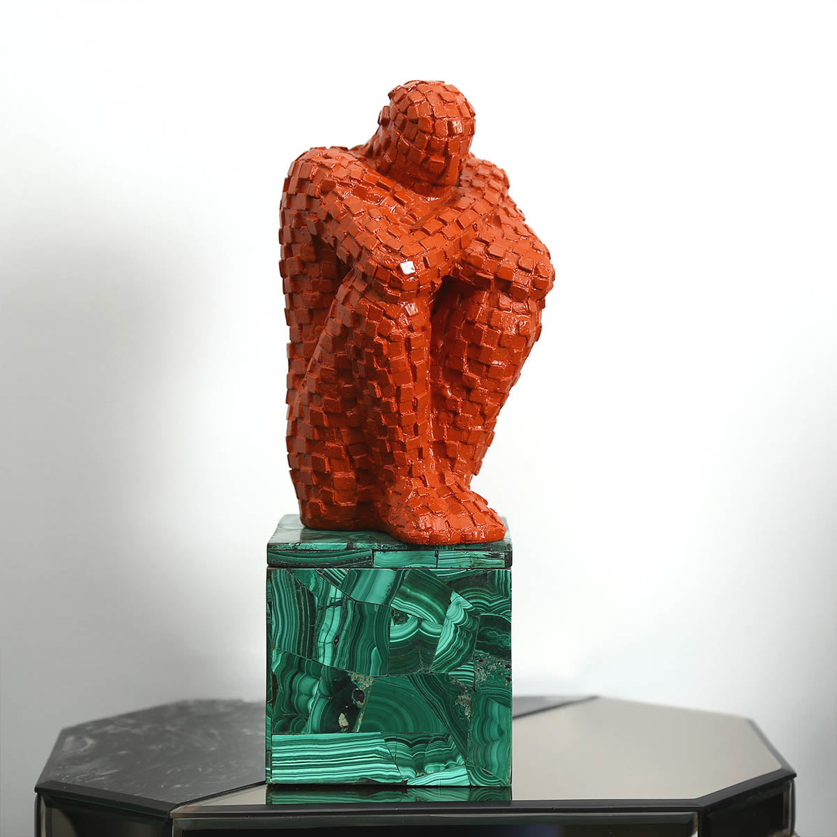 Thinking man sculpture Red